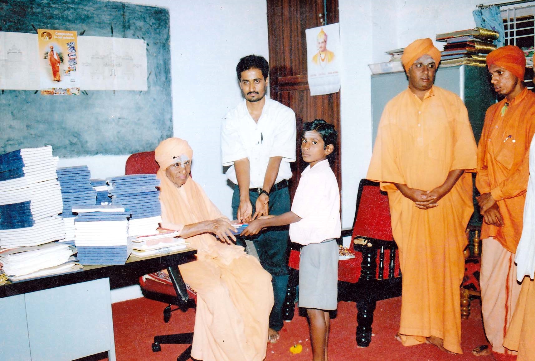 Students and Swamijis during an educational activity at the Mutt