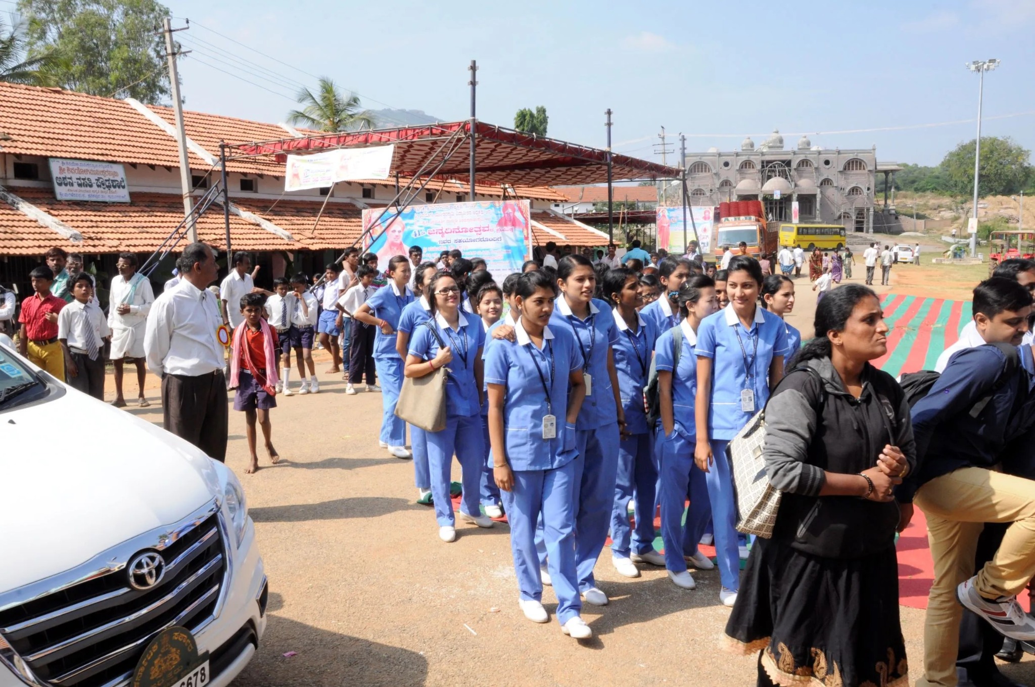Students and community members participating in a health-related camp at Maralegavi Mutt