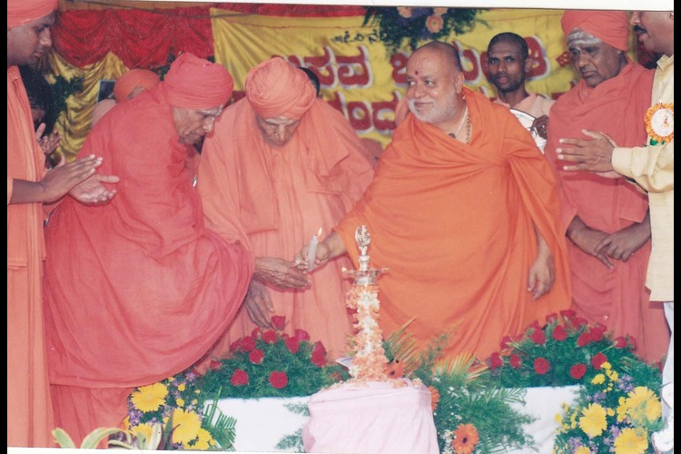 Revered Swamijis gathered during a ceremonial occasion at the Mutt